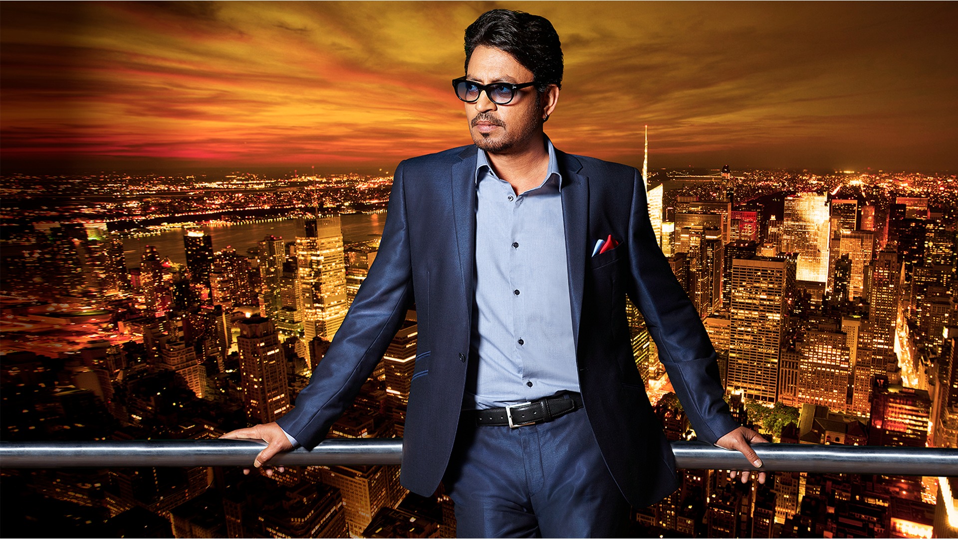 Syska brand ambassador on a city rooftop at night
