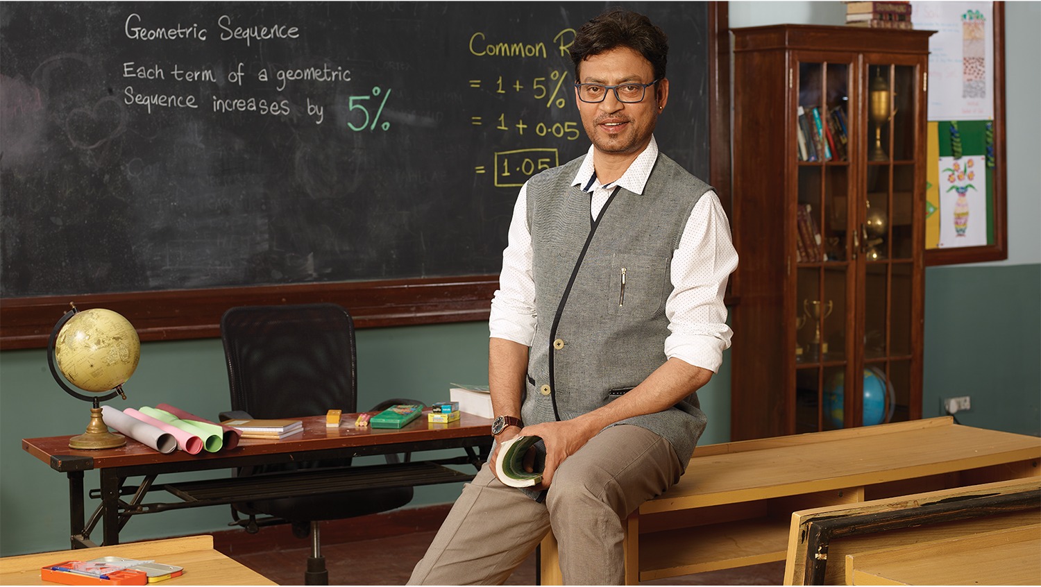 Syska brand ambassador dressed as a teacher in a classroom